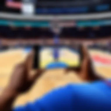 Person watching NBA game on smartphone screen